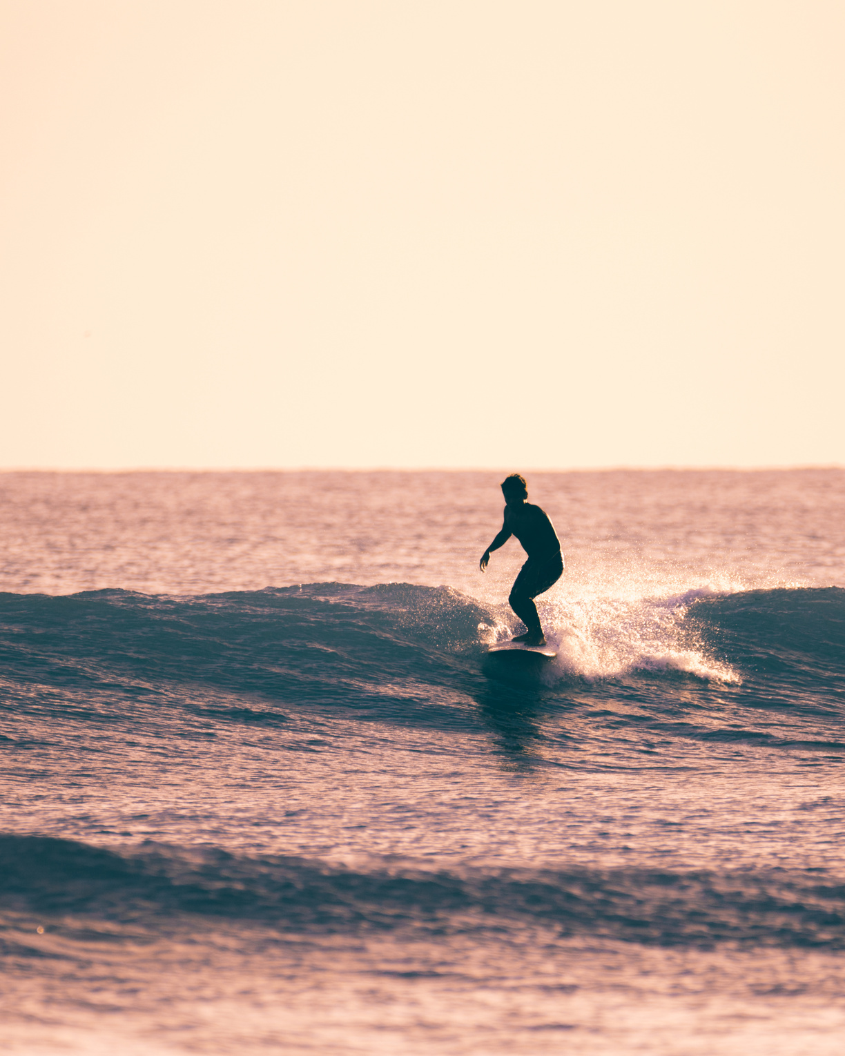 Man Surfing on Sea